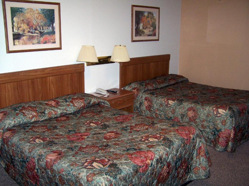 رولا Budget Deluxe Motel الغرفة الصورة